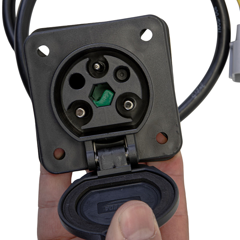 View of the replacement 3-pin charging port with the weatherproof lid open for the X2, X4, and X6 model Madjax golf carts.