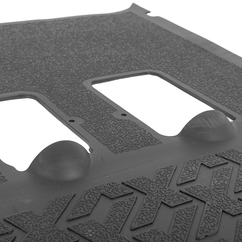 Close up detailed view of the textured finish and X logos molded into the OEM floor mat full coverage replacement for the MadJax XSeries golf cart lineup.