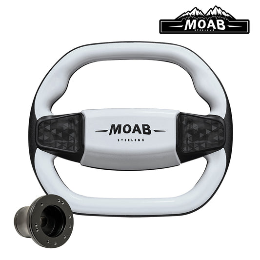Custom golf cart MOAB steering wheel in gloss white finish, featuring MOAB embossed logo, simulated carbon fiber inlays, and sporty flat bottom design, while also including golf cart model adapter and free shipping, sold by Salt City Golf Cart in Hutchinson, Kansas, Item #WA0009.