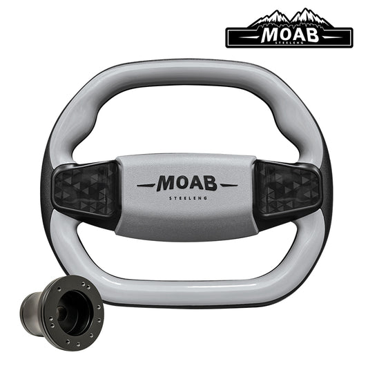 Custom golf cart MOAB steering wheel in gloss gray finish, featuring MOAB embossed logo, simulated carbon fiber inlays, and sporty flat bottom design, while also including golf cart model adapter and free shipping, sold by Salt City Golf Cart in Hutchinson, Kansas, Item #WA0010.