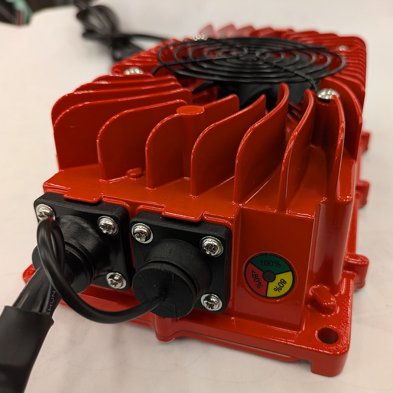 Close up view of the new 48 volt 15 amp smart charge for EZGO RXV and TXT golf carts, sold by Salt City Golf Cart in Hutchinson, Kansas.