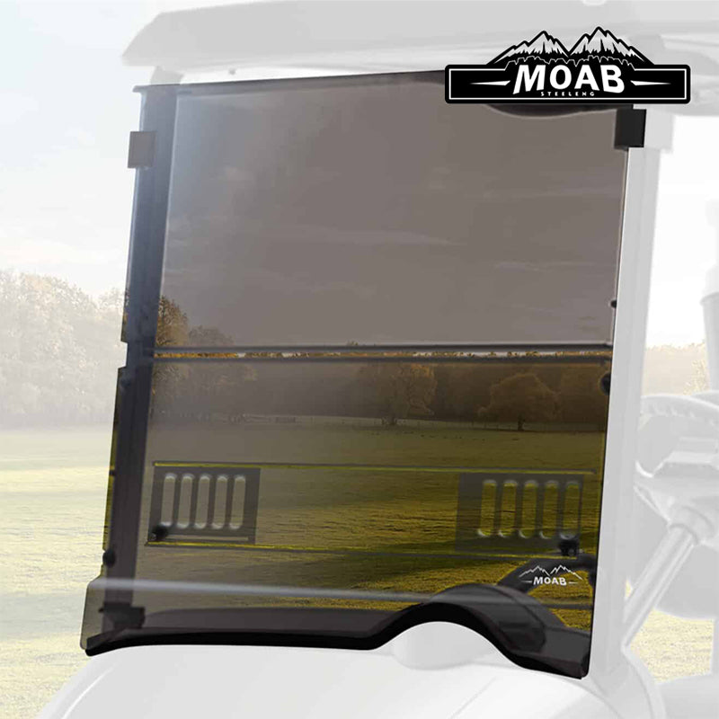 Installed view of the MOAB EZ-GO RXV folding tinted vented golf cart windshield by SGC, made from 4mm acrylic, featuring sliding vents, all mounting hardware, 2-year warranty, best price, and free shipping from Salt City Golf Cart, Item #WSRX10.