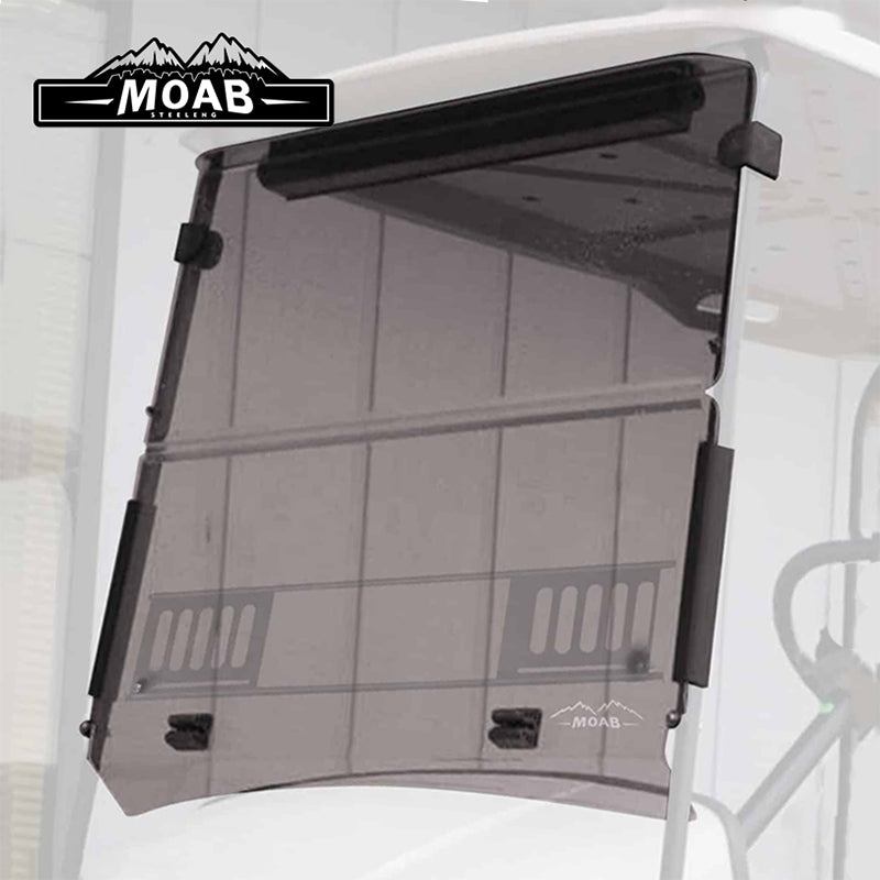 Installed view of the MOAB EZ-GO TXT folding tinted vented golf cart windshield by SGC, model years 1995 through 2013, made from 4mm acrylic, featuring sliding vents, all mounting hardware, 2-year warranty, best price, and free shipping from Salt City Golf Cart, Item #WSTX09.